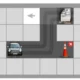Quadrícula com obstáculos viários: seta para a célula central, carro inferior esquerdo e caminhão superior direito.