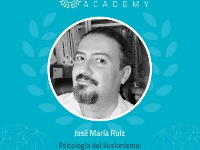 Homem de barba sorridente diante do logotipo NeuronUP Academy e símbolos de neuropsicologia, ilustrando cognição e emoção.