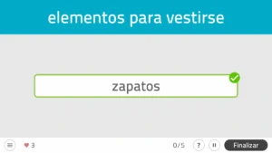Interface do NeuronUP: Categorias em contra-relógio, texto 'elementos para vestir-se', campo 'sapatos' verificado e contador de 3 pontos.