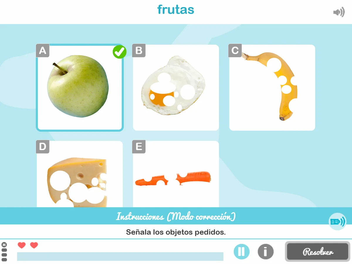 Série d'images d'aliments : pomme verte avec coche, fromages et banane avec trous ; bouton de réinitialisation.