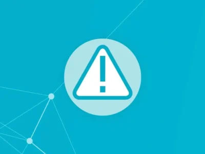 Rappresentazione grafica di avvertimento circolare con triangolo e punto esclamativo, contornata da linee e nodi di rete.