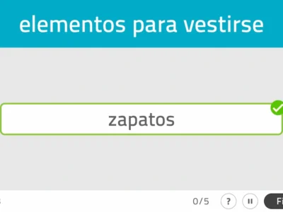 Interfaz de NeuronUP: categorías a contrarreloj, texto 'elementos para vestirse', campo 'zapatos' verificado y contador 3.